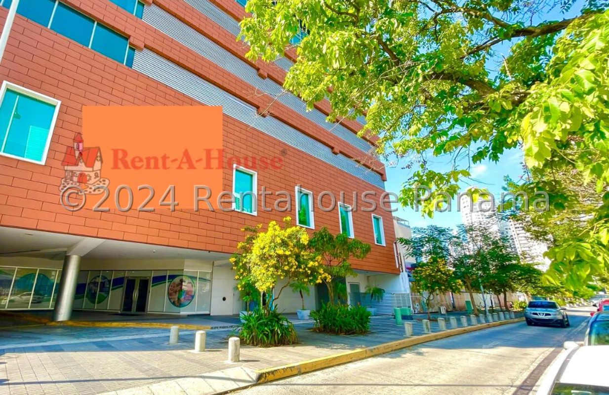 Reception area with curved desk and glass entrance PH Corporate Tower Panama City Panama