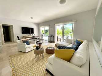 Master suite featuring terrace access and ocean views in Buenaventura Panama condo