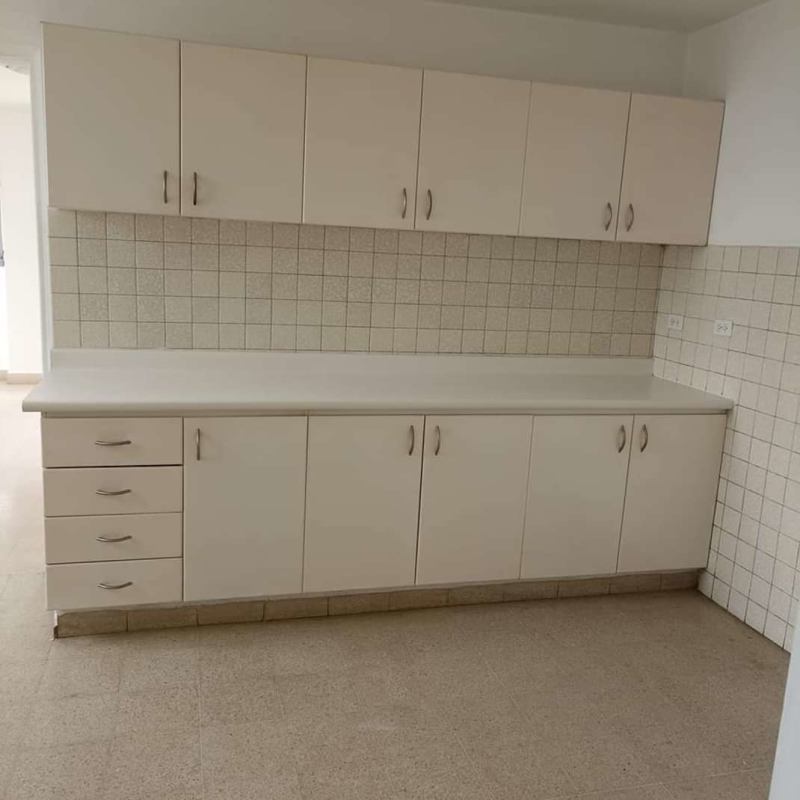 Bright kitchen with cabinets tiled backsplash Calle 50 Panama City apartment