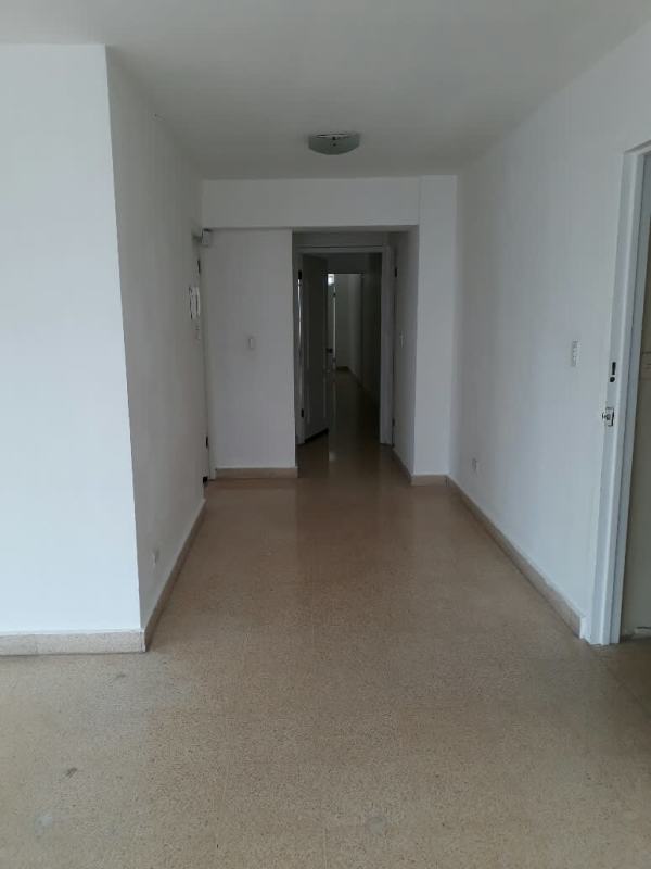 Bedroom with closet space, natural light, tile floors, Panama City Calle 50 apartment