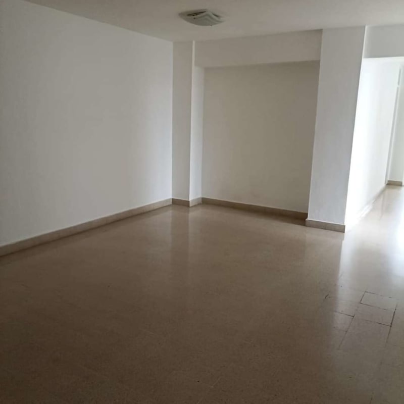 Spacious bedroom with built-in storage and large windows apartment Calle 50 Panama