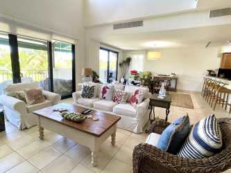 Contemporary kitchen design with wood accents and granite at Buenaventura Casa del Sol