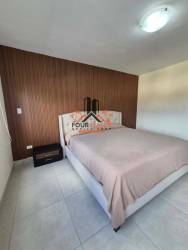 Bedroom offering garden and nature views at PH Midrise Panama Pacifico