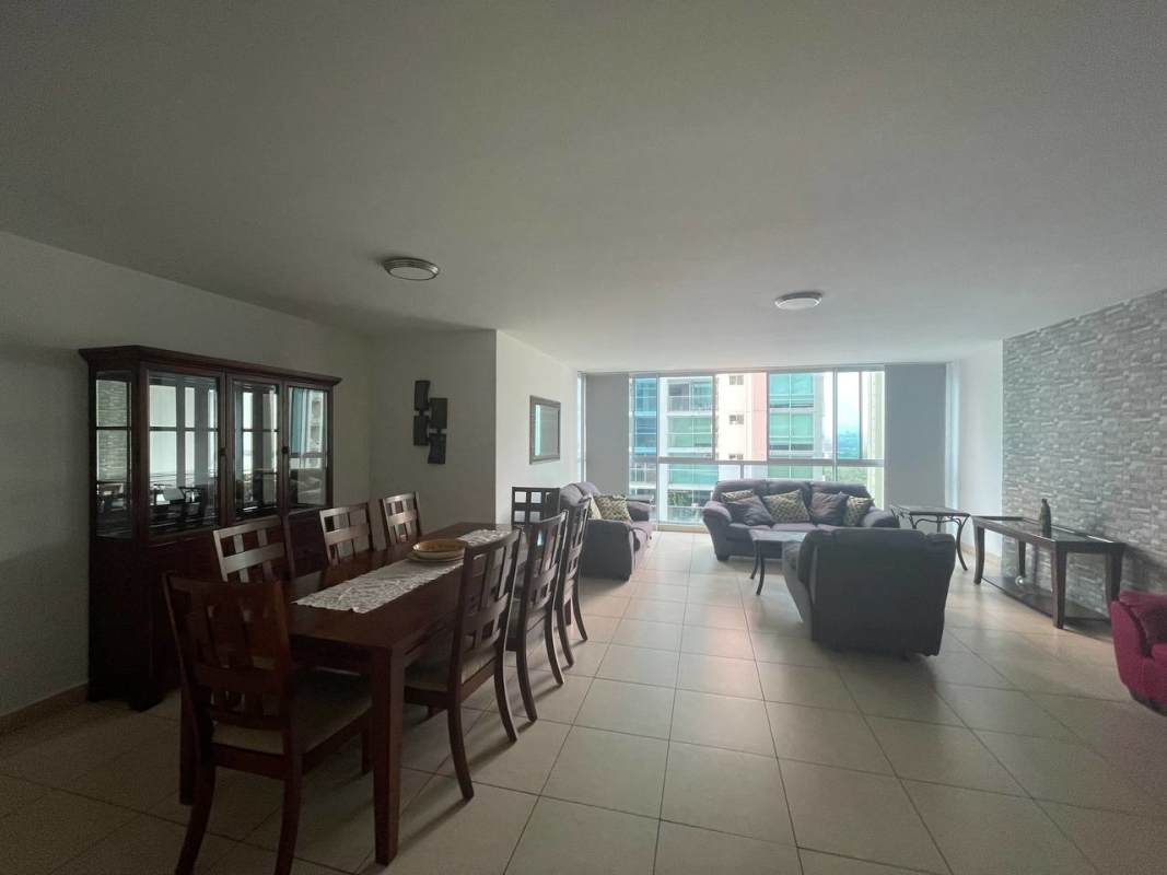 Spacious master bedroom with built-in closets, tile floors, large window and en-suite bath at PH Costa View Costa del Este Panama