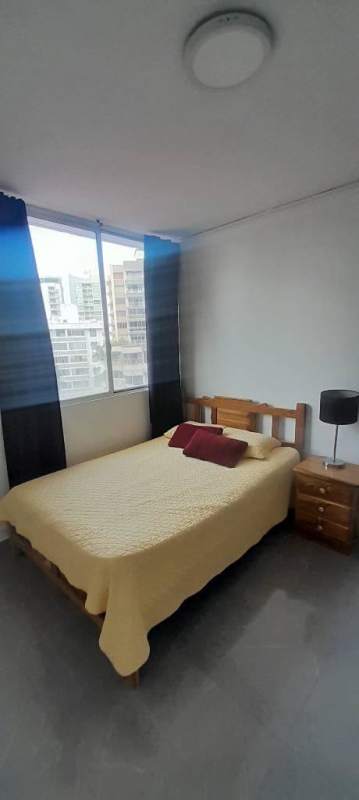 Bright bedroom with large window and city view in PH Torre El Cangrejo El Cangrejo Panama