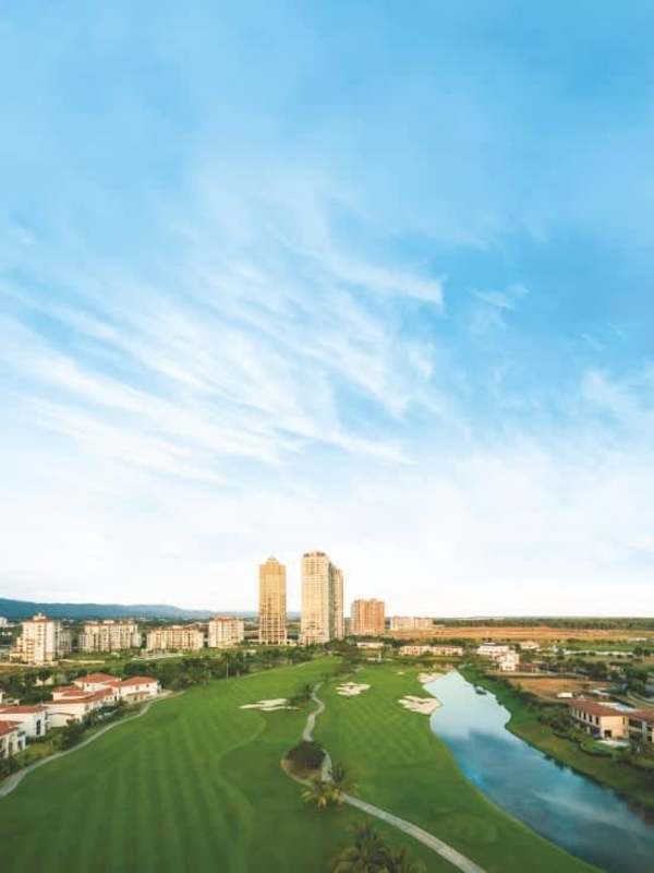 Aerial view exclusive golf community with high-rise towers Santa María in Panama City