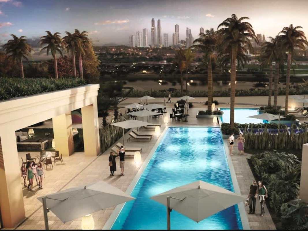 Swimming pool with sun loungers and skyline backdrop Santa María Panama