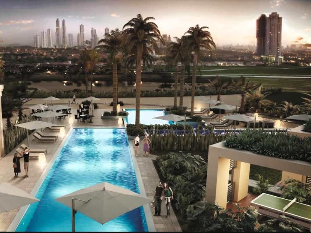 Luxury pool area with lounge zones, city skyline The Reserve Santa María Panama