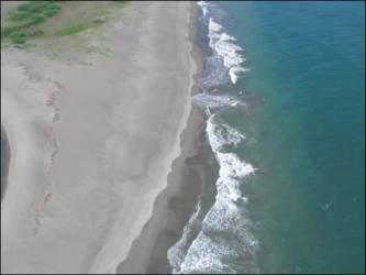 Wide sand beach with ocean approach Isla Caña coastal property