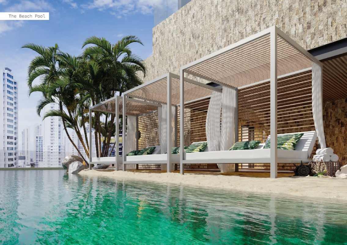 Luxurious rooftop pool resembling beach with cabanas and skyline view PH Dovle Panama