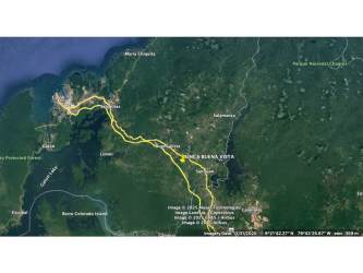 Rural dirt road leading into wooded farmland property Buena Vista Colón Panama