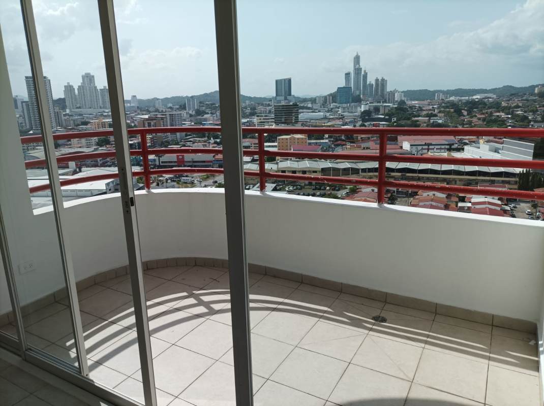 Balcony with red railing offering skyline view from PH Plaza Marquez apartment
