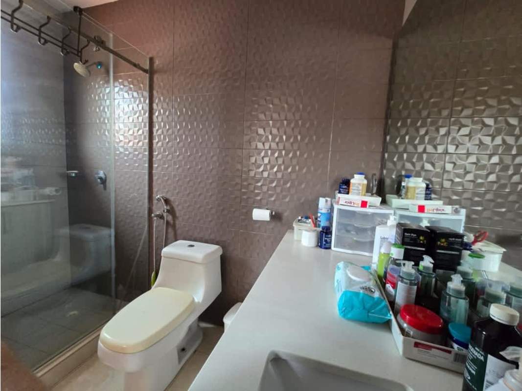 Bathroom with granite vanity and glass shower enclosure furnished house Versalles Panama