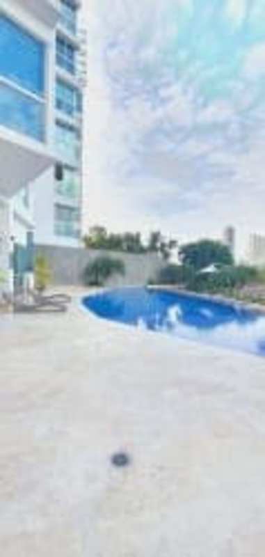 Infinity pool on elevated terrace with ocean and skyline views luxury tower Punta Pacifica