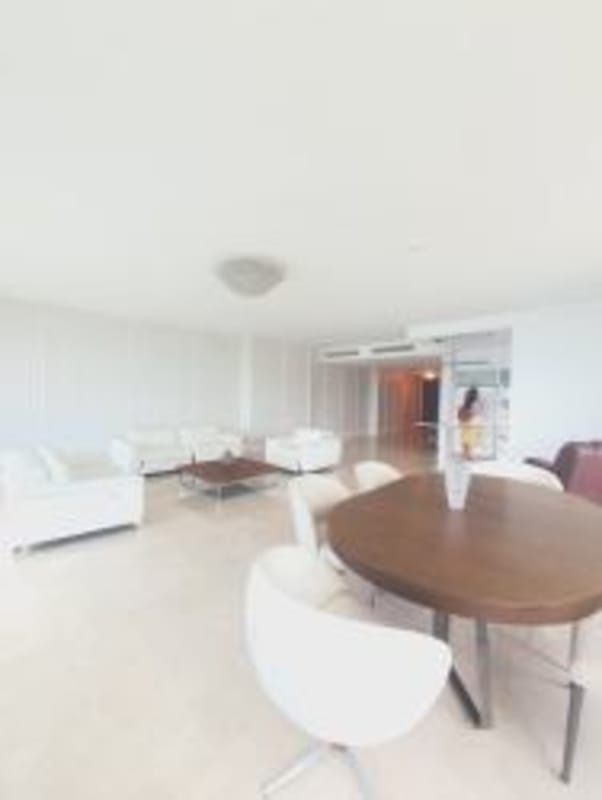 Elegant ocean-view living room with marble flooring in luxury Grand Tower condo Punta Pacifica Panama