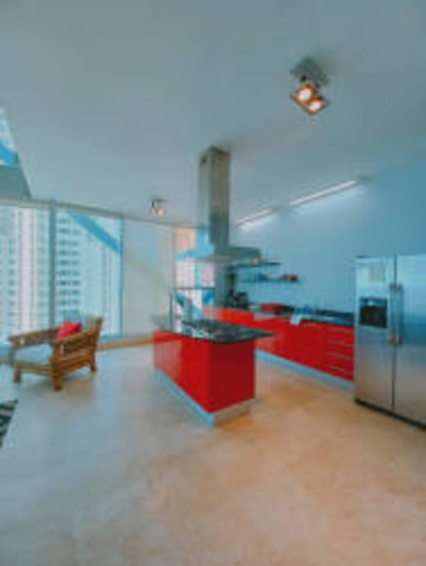 Open kitchen modern design with center island and floor-to-ceiling window city view in Loft 41