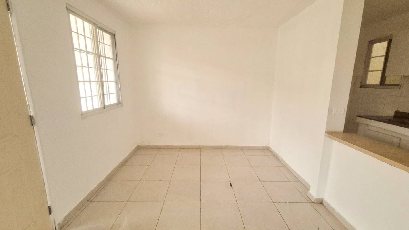 Bright living dining with large window porcelain floors PH Villas del Naranjal