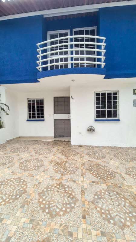 Open living dining area with tiled floors and staircase in PH Villas del Naranjal Pedregal Panama