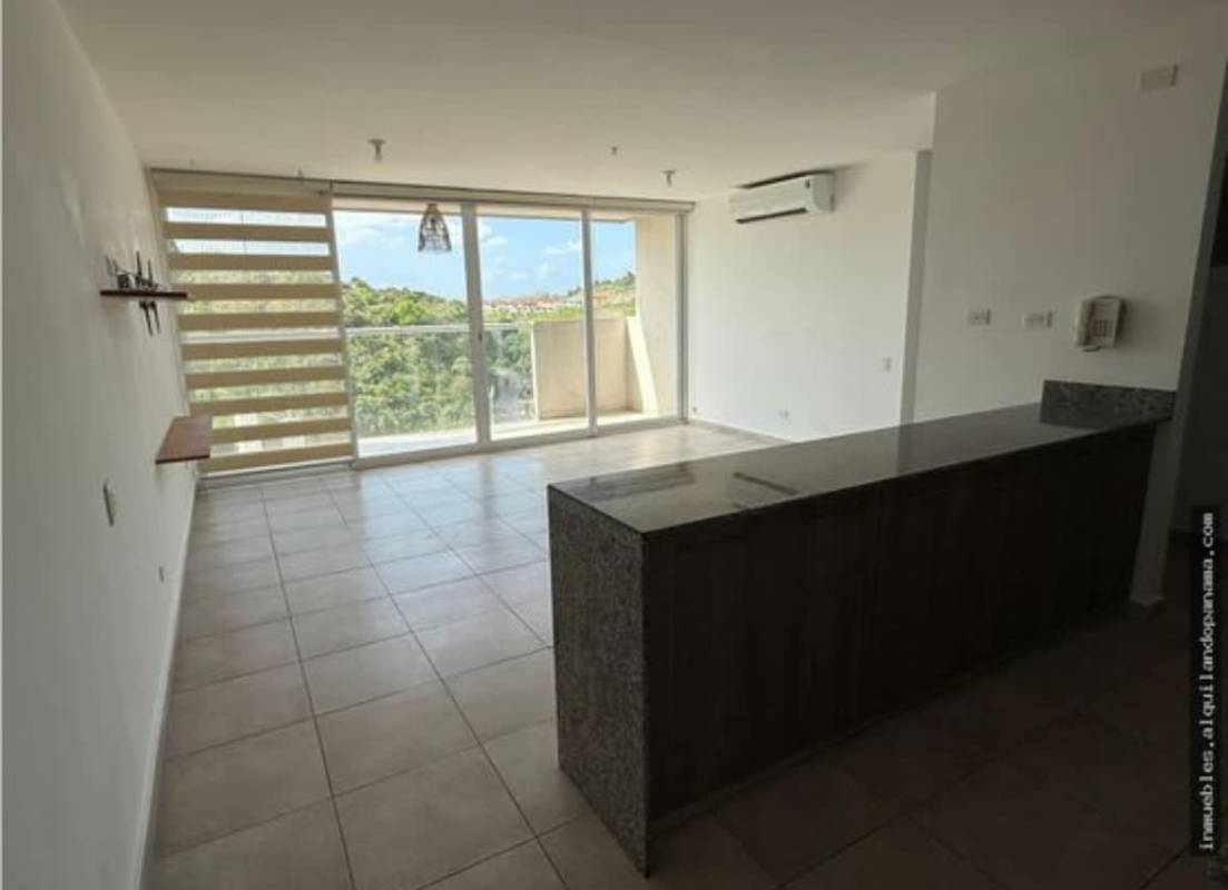 Living room with large windows, balcony access at PH Hacienda Golf Brisas del Golf Panama