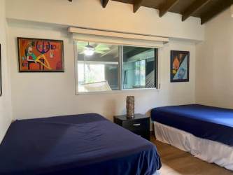 Modern kitchen with granite countertop and stainless appliances in villa Bouganvilla Coronado Panama