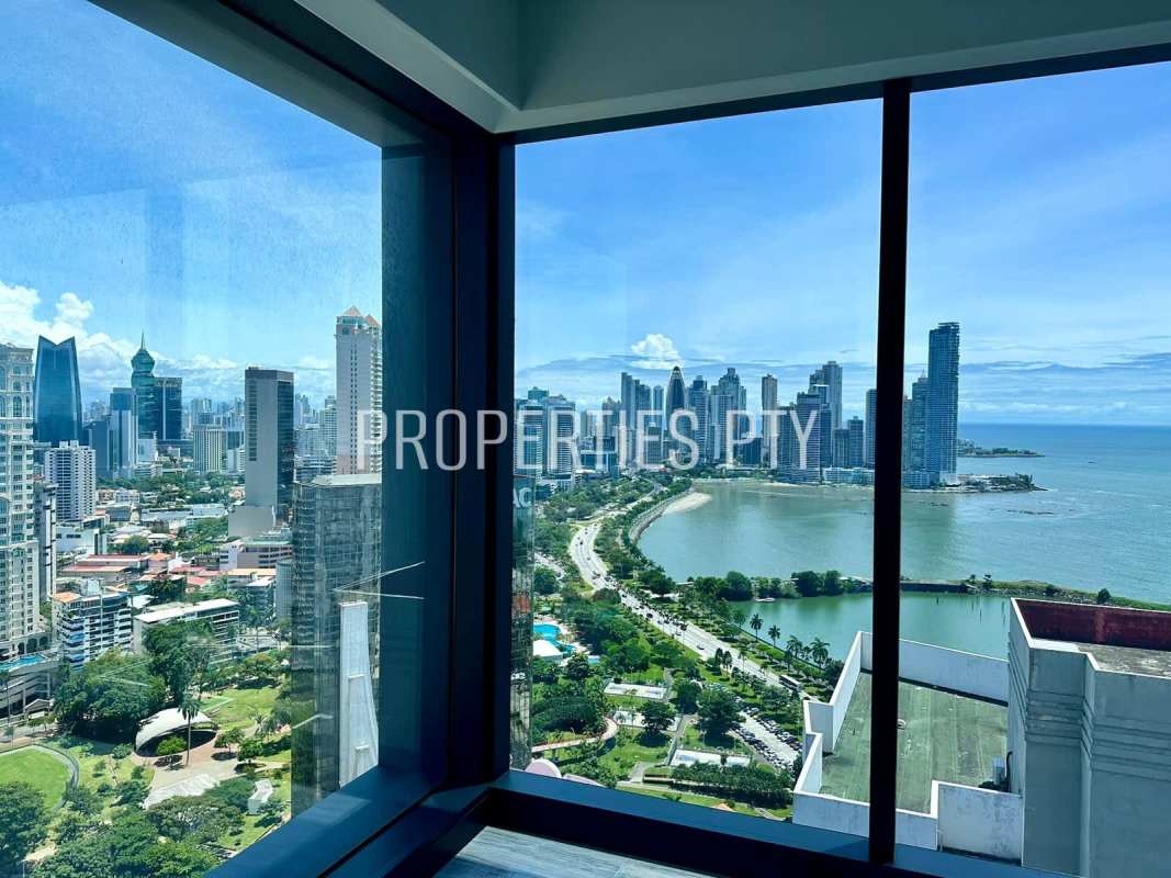 Panoramic windows with skyline and waterfront views from Nuovo by Armani apartment