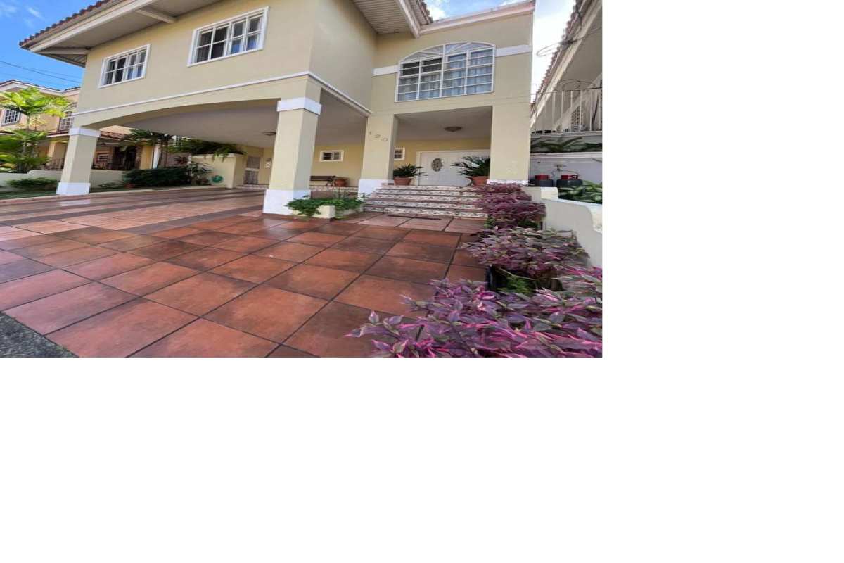 Traditional kitchen with wood cabinets, stainless appliances, granite countertop in Villa de las Fuentes Panama