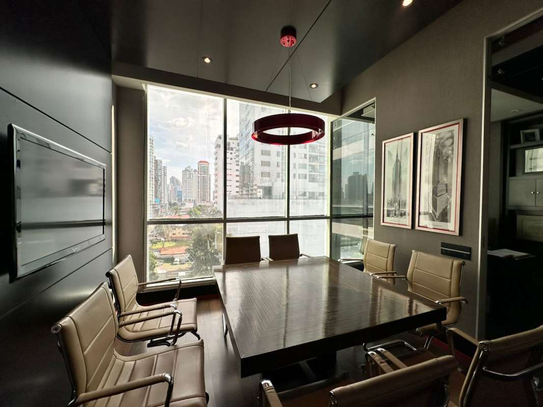 Modern boardroom with city skyline views and leather chairs in PH BICSA Tower Panama