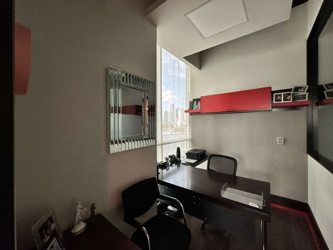 Private office space with large window, modern decor at PH BICSA Tower Panama City