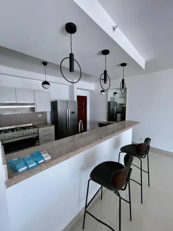 Modern bedroom with large windows, city view, built-in wardrobe at PH Top Tower Costa del Este Panama