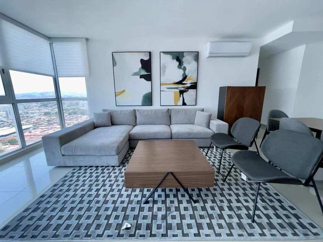 Bedroom with balcony city view, large bed, modern furniture at PH Top Tower Costa del Este Panama