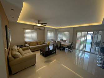 Open living and dining area with natural light in PH Woodlands duplex Panama Pacifico