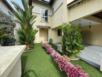 Front view of duplex with landscaped garden in PH Woodlands Panama Pacifico