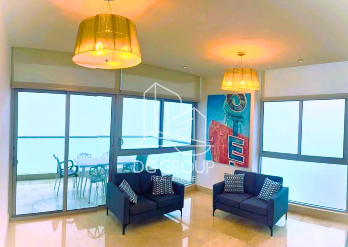 Entrance hall leading to living room with marble floors and city view PH Ten Tower Panama