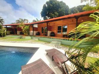 Tropical style lodge property with pool bungalows in Panama surf destination