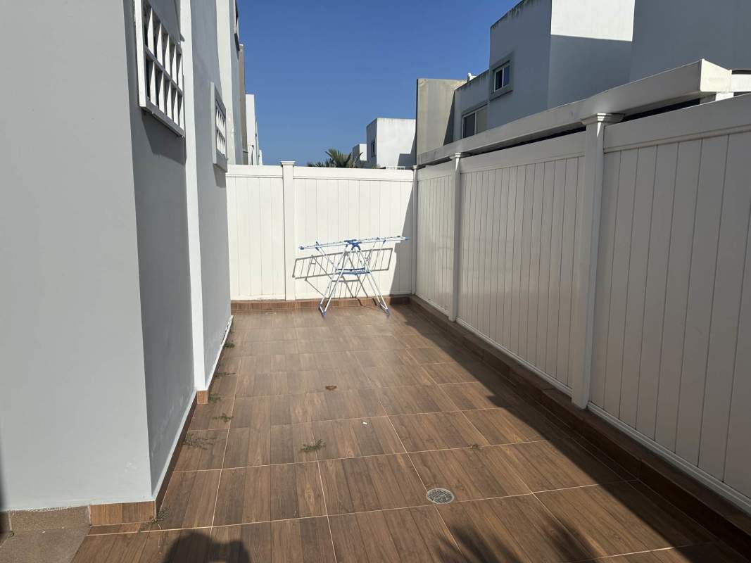Bright open living dining space with sliding doors to patio in PH Victoria Brisas del Golf