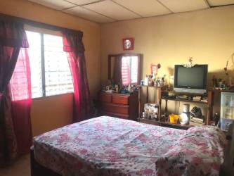 Interior hallway leading to bedrooms with ceramic tiles Capira Panama property