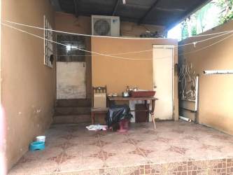 Covered patio with sink and laundry potential in residential home Capira Panama