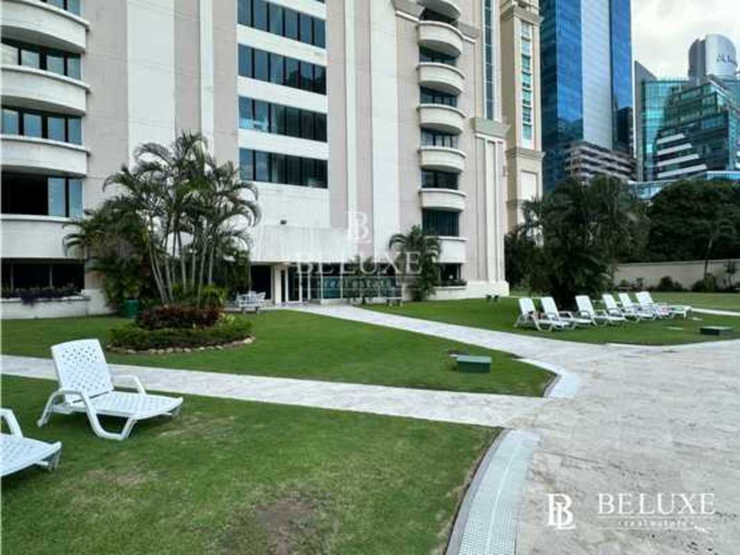 Large master bedroom with windows and city ocean views PH Costa Pacifica