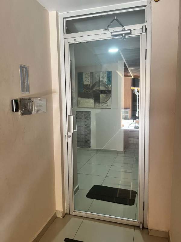 Semi-enclosed kitchen granite countertop ample storage Mallorca Park Village apartment sale San Miguelito Panama City