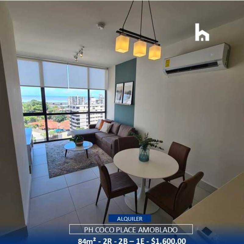 Dining area with city and partial ocean view in furnished apartment for rent Coco del Mar