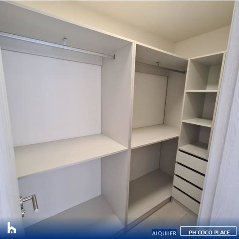 Open concept kitchen with stainless appliances in PH Coco Place Coco del Mar Panama