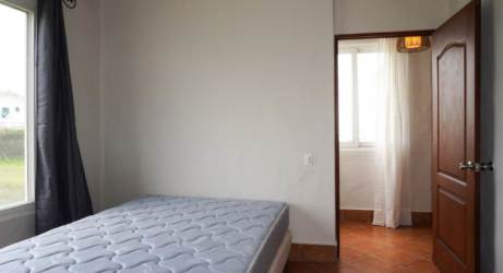 Bright second bedroom with AC tile floors Vista Mar Golf Beach Marina condo Panama