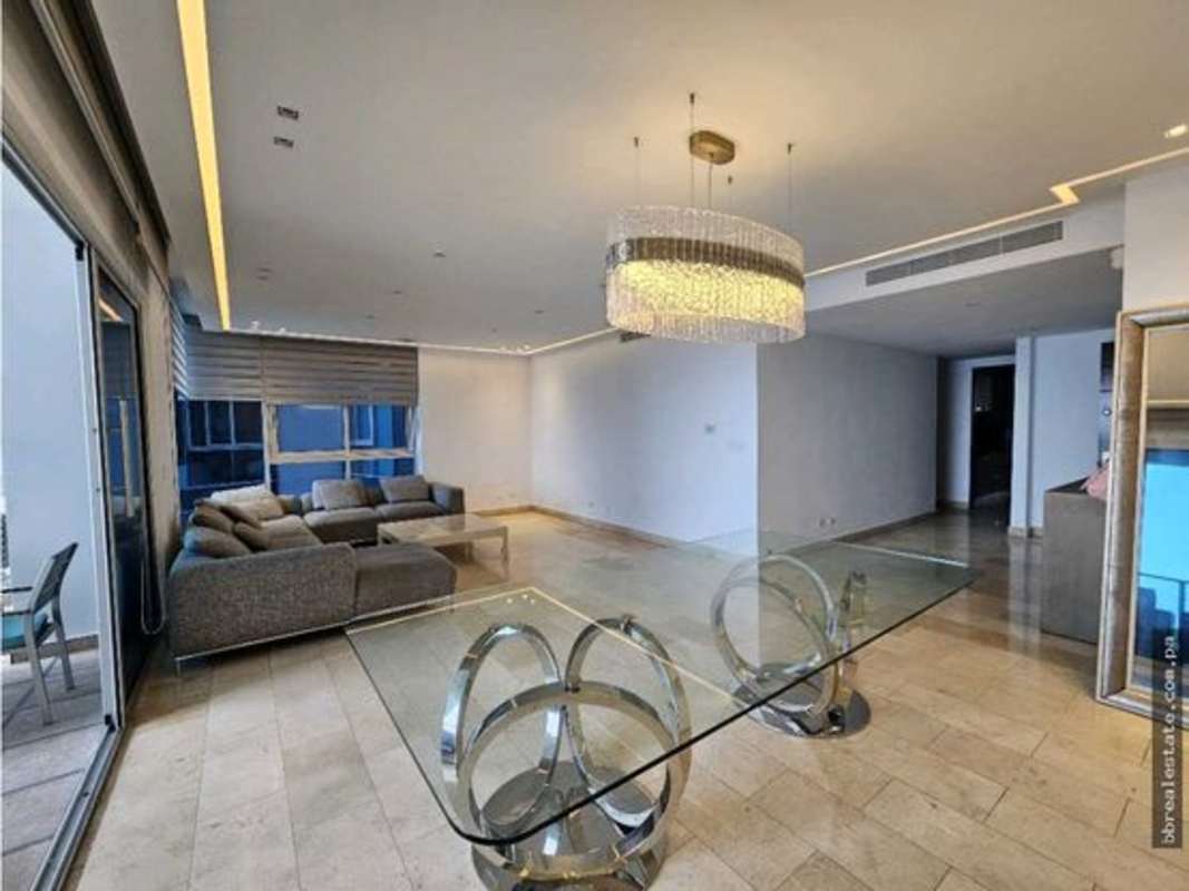 Spacious living dining area with marble floors floor-to-ceiling windows PH Pacific Village Punta Pacífica Panama