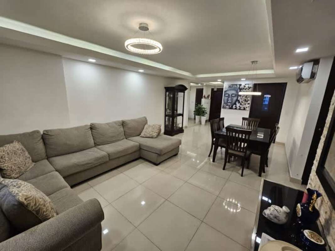 Bright living dining area with ceramic floors and neutral decor in PH Atlantis El Cangrejo Panama City
