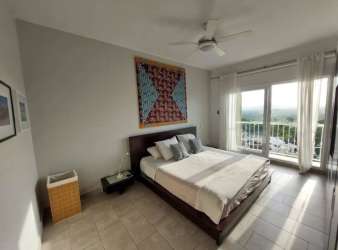 Open concept living dining with tile floors and balcony PH Tucan Country Club Panama Pacifico