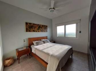 Master bedroom with panoramic windows PH Tucan Country Club Panama