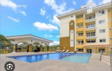 Pool area with sun deck, pavilion and multi-story condos PH Tucan Panama