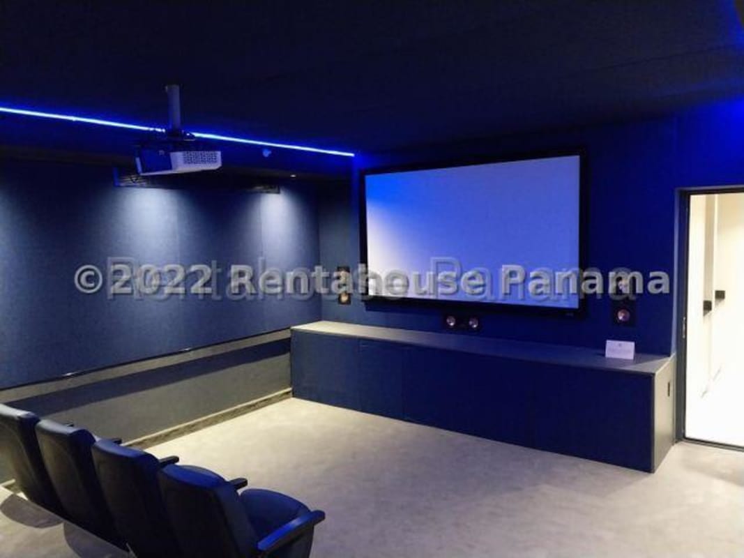 Private cinema room with screen and seating in Park City Tower Bella Vista Panama