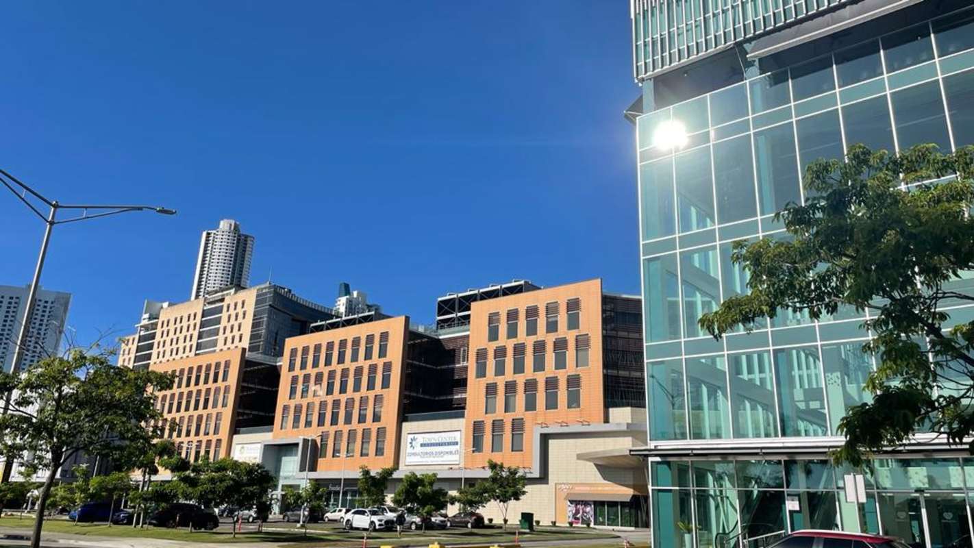 Cityscape with modern offices shopping plaza and blue sky Town Center Costa del Este Panama