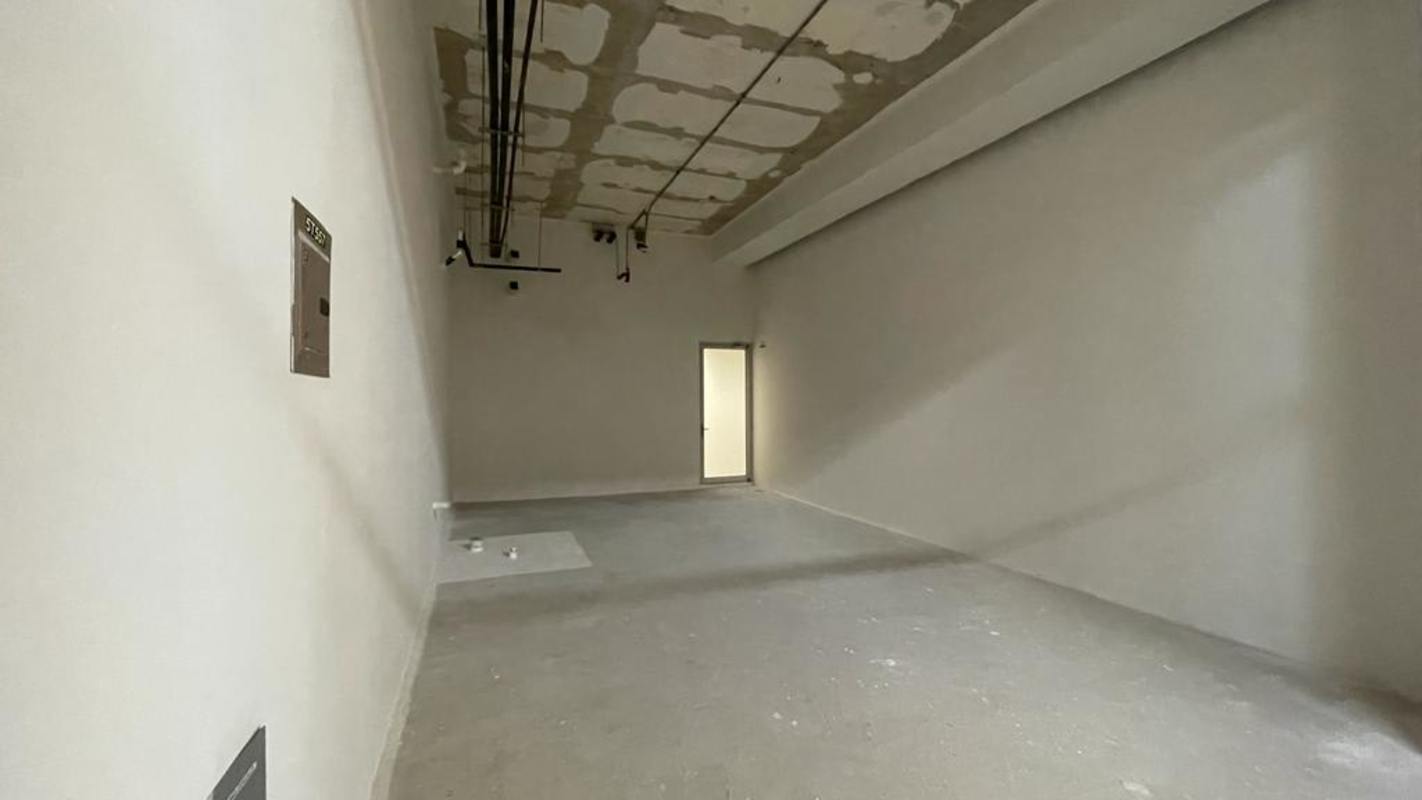 Exposed conduit unfinished utility or service space inside commercial tower Costa del Este Panama